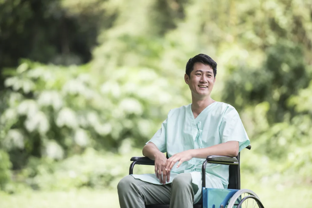 Stallio Outsourcing Comprehensive outsourcing solutions. Alone Young Disabled Man In Wheelchair At The Garden